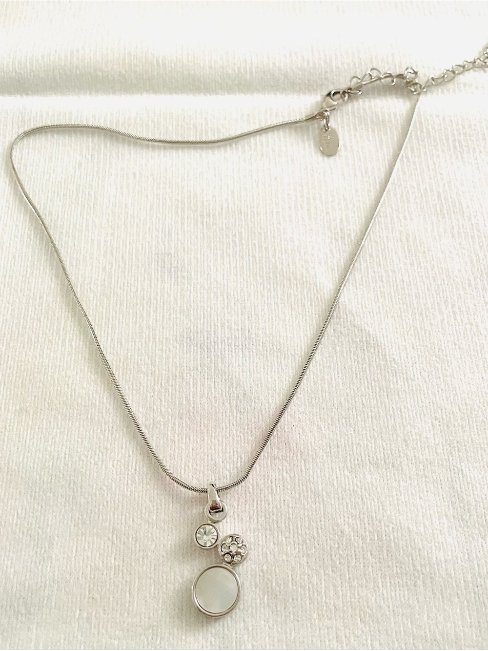 Lia Sophia Silver-Tone Triple Charm Necklace with White and Crystal Accents